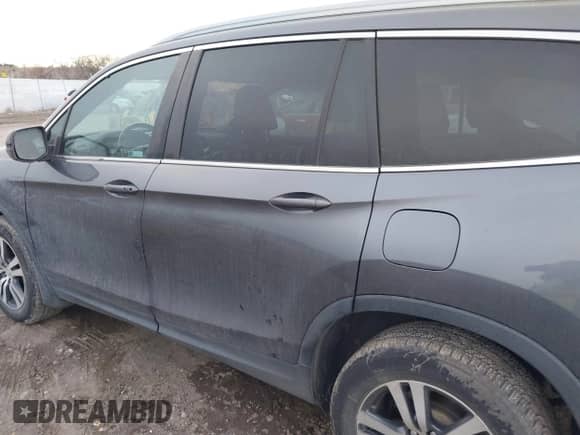 2018 Honda Pilot EX-L with VIN 5FNYF6H75JB012945, listed as a IAAI auction lot 41167606 with 73,430 mi miles and . Bid and sale history available at DreamBid. Image 20.