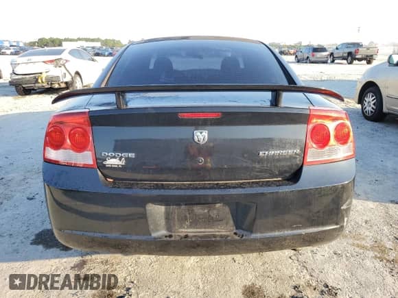 2009 Dodge Charger SE с VIN 2B3KA43D99H551971, выставлен на аукционе Copart как лот 75845044 с пробегом 203 248 миль миль и Списание • Salvage title. История ставок и продаж доступна на DreamBid. Изображение 6.