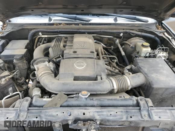 2016 Nissan Frontier Desert Runner z VIN 1N6AD0ER1GN747021, wystawiony jako Copart lot #54564895 z przebiegiem 219 647 mil mil oraz Szkoda całkowita • Salvage title. Historia ofert i sprzedaży dostępna na DreamBid. Obrazek 11.