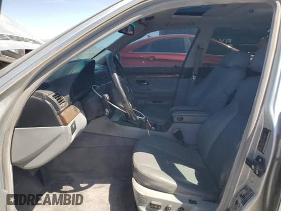 1997 BMW 7 Series with VIN WBAGK2327VDH68057, listed as a Copart auction lot 55881224 with 178,322 mi miles and Salvage title. Bid and sale history available at DreamBid. Image 7.