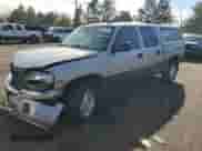 2004 GMC Sierra 1500 SLT with VIN 2GTEK13TX41356574, listed as a Copart auction lot 81002774 with 235,272 mi miles and Salvage title. Bid and sale history available at DreamBid. Image 1.