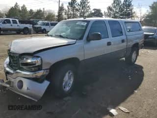2004 GMC Sierra 1500 SLT with VIN 2GTEK13TX41356574, listed as a Copart auction lot 81002774 with 235,272 mi miles and Salvage title. Bid and sale history available at DreamBid. Image 1.