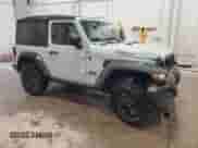 2023 Jeep Wrangler Sport with VIN 1C4HJXAG7PW617021, listed as a Copart auction lot 59928305 with 8,503 mi miles and Salvage title. Bid and sale history available at DreamBid. Image 4.