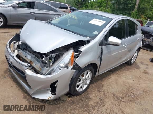 2015 Toyota Prius One z VIN JTDKDTB38F1582101, wystawiony jako IAAI lot #42429002 z przebiegiem 182 948 mil mil oraz . Historia ofert i sprzedaży dostępna na DreamBid. Obrazek 2.