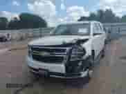 2019 Chevrolet Tahoe LT with VIN 1GNSCBKCXKR276758, listed as a IAAI auction lot 43302261 with 92,687 mi miles and . Bid and sale history available at DreamBid. Image 2.