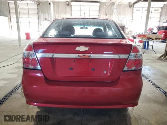 2011 Chevrolet Aveo 1LT z VIN KL1TD5DE5BB140970, wystawiony jako Copart lot #70408755 z przebiegiem 125 468 mil mil oraz Szkoda całkowita • Salvage title. Historia ofert i sprzedaży dostępna na DreamBid. Obrazek 6.
