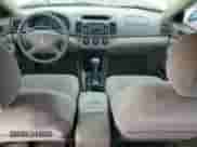 2002 Toyota Camry XLE с VIN 4T1BE32K22U106533, выставлен на аукционе Copart как лот 64502205 с пробегом 155 725 миль миль и Списание • Salvage title. История ставок и продаж доступна на DreamBid. Изображение 8.