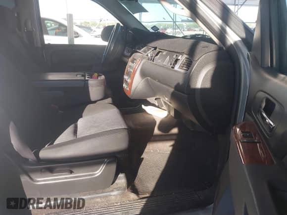 2011 Chevrolet Tahoe LS with VIN 1GNSCAE00BR149044, listed as a IAAI auction lot 42812452 with 202,115 mi miles and . Bid and sale history available at DreamBid. Image 5.