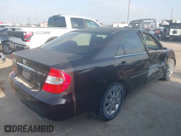 2004 Toyota Camry LE with VIN JTDBF32K440154756, listed as a IAAI auction lot 43069925 with 124,422 mi miles and . Bid and sale history available at DreamBid. Image 4.