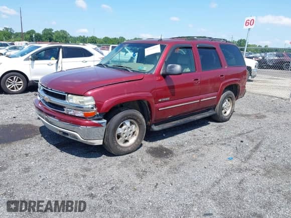 2002 Chevrolet Tahoe Z71 z VIN 1GNEK13Z42R316734, wystawiony jako IAAI lot #42566892 z przebiegiem 240 000 mil mil oraz . Historia ofert i sprzedaży dostępna na DreamBid. Obrazek 2.