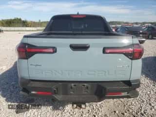2022 Hyundai Santa Cruz SEL Premium with VIN 5NTJDDAF8NH034329, listed as a Copart auction lot 81968125 with 59,231 mi miles and Non repairable. Bid and sale history available at DreamBid. Image 6.