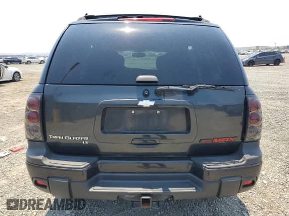 2005 Chevrolet TrailBlazer LT z VIN 1GNDS13S252325377, wystawiony jako Copart lot #64788165 z przebiegiem Nie podano mil oraz Szkoda całkowita • Salvage title. Historia ofert i sprzedaży dostępna na DreamBid. Obrazek 6.