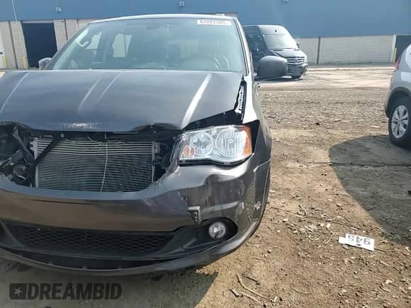 2020 Dodge Grand Caravan SXT with VIN 2C4RDGCG7LR169620, listed as a Copart auction lot 67822585 with 136,031 mi miles and Salvage title. Bid and sale history available at DreamBid. Image 14.