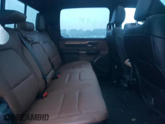 2023 Ram 1500 Longhorn with VIN 1C6SRFKT0PN581982, listed as a Copart auction lot 80799214 with 33,244 mi miles and Salvage title. Bid and sale history available at DreamBid. Image 11.