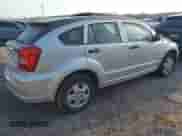 2009 Dodge Caliber SE with VIN 1B3HB28A69D169338, listed as a IAAI auction lot 41872461 with 101,675 mi miles and . Bid and sale history available at DreamBid. Image 4.