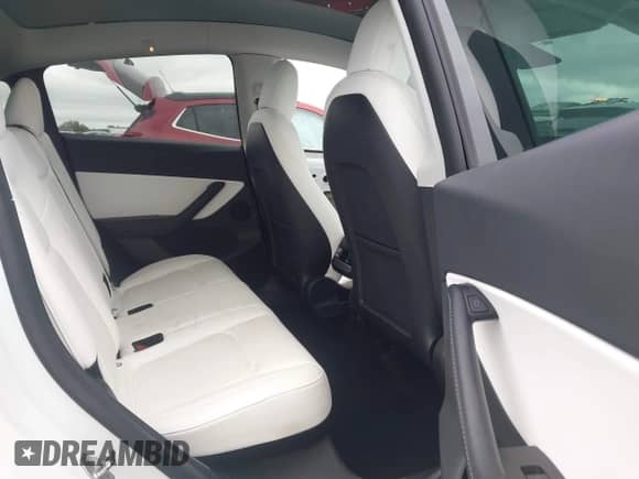 2022 Tesla Model Y Long Range z VIN 7SAYGDEE6NF317707, wystawiony jako IAAI lot #43186532 z przebiegiem 45 306 mil mil oraz . Historia ofert i sprzedaży dostępna na DreamBid. Obrazek 8.