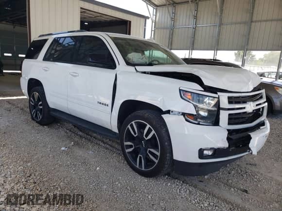 2018 Chevrolet Tahoe Premier with VIN 1GNSKCKJXJR251316, listed as a Copart auction lot 61205895 with 134,233 mi miles and Salvage title. Bid and sale history available at DreamBid. Image 4.