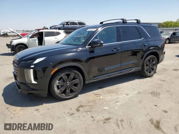 2023 Hyundai Palisade XRT с VIN KM8R34GE5PU586443, выставлен на аукционе Copart как лот 63532345 с пробегом 24 508 миль миль и Списание • Salvage title. История ставок и продаж доступна на DreamBid. Изображение 1.