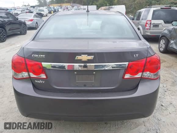 2011 Chevrolet Cruze 1FL z VIN 1G1PE5S99B7224301, wystawiony jako IAAI lot #43384280 z przebiegiem 188 159 mil mil oraz . Historia ofert i sprzedaży dostępna na DreamBid. Obrazek 16.