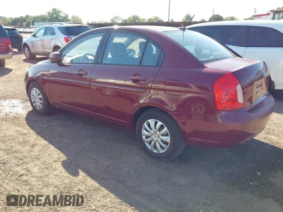 2011 Hyundai Accent GLS z VIN KMHCN4AC0BU574054, wystawiony jako IAAI lot #43186432 z przebiegiem 205 376 mil mil oraz . Historia ofert i sprzedaży dostępna na DreamBid. Obrazek 3.