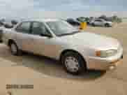 1996 Toyota Camry DX z VIN JT2BG12K4T0391773, wystawiony jako Copart lot #68545815 z przebiegiem 103 853 mil mil oraz Szkoda całkowita • Salvage title. Historia ofert i sprzedaży dostępna na DreamBid. Obrazek 4.