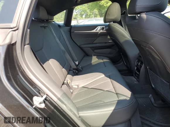 2024 BMW i4 M50 с VIN WBY33AW02RFS79297, выставлен на аукционе Copart как лот 62890645 с пробегом 423 миль миль и Списание • Salvage title. История ставок и продаж доступна на DreamBid. Изображение 10.