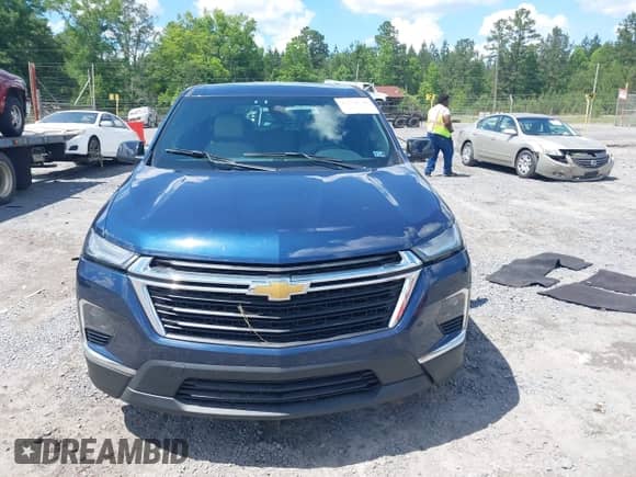 2022 Chevrolet Traverse LS z VIN 1GNEVFKW5NJ100986, wystawiony jako IAAI lot #42254550 z przebiegiem Nie podano mil oraz . Historia ofert i sprzedaży dostępna na DreamBid. Obrazek 12.