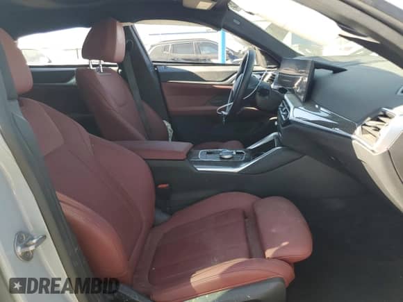 2024 BMW i4 M50 with VIN WBY33AW00RFS44550, listed as a Copart auction lot 63332305 with 10,114 mi miles and Salvage title. Bid and sale history available at DreamBid. Image 7.
