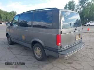 1999 Chevrolet Astro z VIN 1GNDM19W2XB102859, wystawiony jako IAAI lot #43426478 z przebiegiem 200 290 mil mil oraz . Historia ofert i sprzedaży dostępna na DreamBid. Obrazek 3.