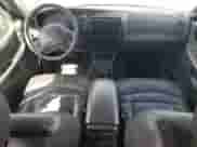 1999 Ford Explorer XLT with VIN 1FMZU34E1XZA28197, listed as a Copart auction lot 58852855 with 115,367 mi miles and Salvage title. Bid and sale history available at DreamBid. Image 8.