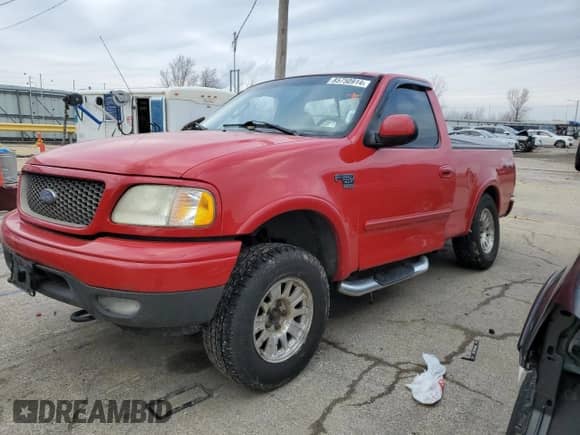 2002 Ford F-150 XL with VIN 1FTRF18W72NB59320, listed as a Copart auction lot 85750914 with 282,198 mi miles and Salvage title. Bid and sale history available at DreamBid. Image 1.