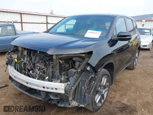 2022 Honda Passport EX-L with VIN 5FNYF8H59NB024628, listed as a IAAI auction lot 43084397 with 33,671 mi miles and . Bid and sale history available at DreamBid. Image 2.