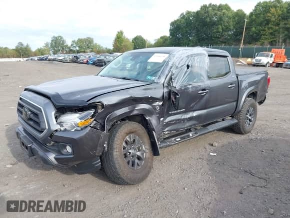 2021 Toyota Tacoma SR with VIN 3TMCZ5AN7MM383352, listed as a IAAI auction lot 43246296 with 44,937 mi miles and . Bid and sale history available at DreamBid. Image 17.