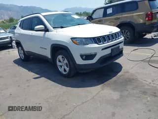 2021 Jeep Compass Latitude with VIN 3C4NJDBB9MT560794, listed as a IAAI auction lot 42493171 with 104,102 mi miles and . Bid and sale history available at DreamBid. Image 1.