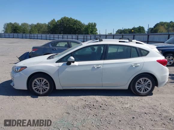 2017 Subaru Impreza Premium with VIN 4S3GTAD67H3754680, listed as a IAAI auction lot 43458582 with 157,391 mi miles and . Bid and sale history available at DreamBid. Image 14.