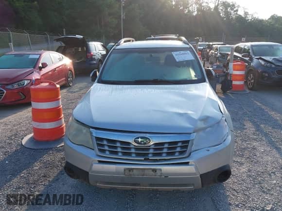 2011 Subaru Forester X Premium with VIN JF2SHADCXBH741354, listed as a IAAI auction lot 42568062 with 205,768 mi miles and . Bid and sale history available at DreamBid. Image 12.