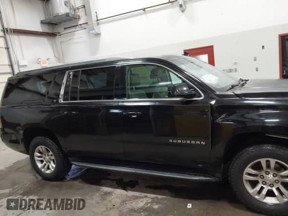 2015 Chevrolet Suburban LT with VIN 1GNSKJKC2FR508739, listed as a IAAI auction lot 43262952 with 152,482 mi miles and . Bid and sale history available at DreamBid. Image 13.