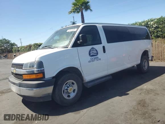 2020 Chevrolet Express Passenger LT with VIN 1GAZGPFG2L1142907, listed as a Copart auction lot 61597535 with 105,182 mi miles and Salvage title. Bid and sale history available at DreamBid. Image 1.