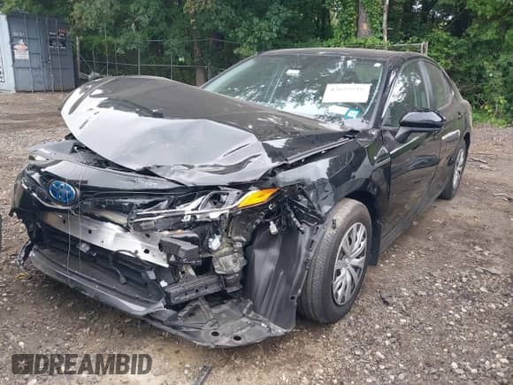 2022 Toyota Camry Hybrid LE with VIN 4T1C31AK3NU570645, listed as a IAAI auction lot 42659916 with 19,420 mi miles and . Bid and sale history available at DreamBid. Image 18.