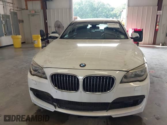 2014 BMW 7 Series ALPINA B7 with VIN WBAYE8C53ED780597, listed as a IAAI auction lot 43130128 with 98,724 mi miles and . Bid and sale history available at DreamBid. Image 12.
