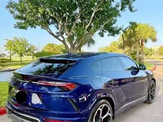 2021 Lamborghini Urus with VIN ZPBUA1ZL0MLA13913, listed as a Copart auction lot 84061045 with 32,057 mi miles and Salvage title. Bid and sale history available at DreamBid. Image 4.