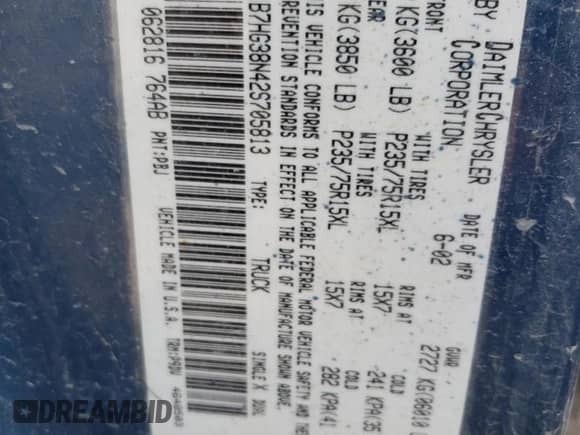 2002 Dodge Dakota Sport z VIN 1B7HG38N42S705813, wystawiony jako Copart lot #66498235 z przebiegiem Nie podano mil oraz Czysty tytuł • Clean title. Historia ofert i sprzedaży dostępna na DreamBid. Obrazek 12.