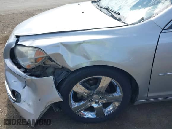 2012 Chevrolet Malibu 1LT z VIN 1G1ZC5E09CF301185, wystawiony jako IAAI lot #43294515 z przebiegiem 136 962 mil mil oraz . Historia ofert i sprzedaży dostępna na DreamBid. Obrazek 17.