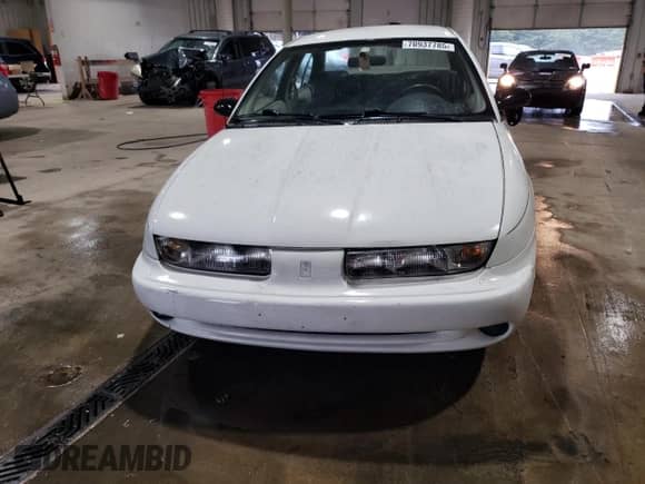 1997 Saturn SL с VIN 1G8ZK5272VZ252757, выставлен на аукционе Copart как лот 70937785 с пробегом 166 639 миль миль и Списание • Salvage title. История ставок и продаж доступна на DreamBid. Изображение 5.