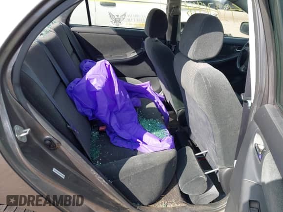 2005 Toyota Corolla CE with VIN 1NXBR32E55Z386418, listed as a IAAI auction lot 43276947 with 267,199 mi miles and . Bid and sale history available at DreamBid. Image 8.