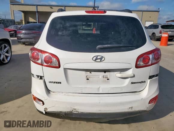 2010 Hyundai Santa Fe GLS z VIN 5NMSG3AB8AH392717, wystawiony jako Copart lot #81711175 z przebiegiem 171 345 mil mil oraz Szkoda całkowita • Salvage title. Historia ofert i sprzedaży dostępna na DreamBid. Obrazek 6.