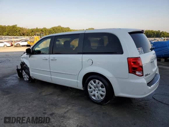 2014 Dodge Grand Caravan American Value with VIN 2C4RDGBG9ER432369, listed as a Copart auction lot 67818555 with 195,062 mi miles and Salvage title. Bid and sale history available at DreamBid. Image 2.