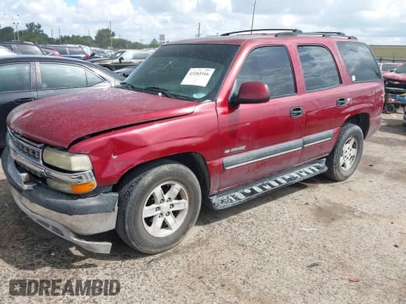 2002 Chevrolet Tahoe LS z VIN 1GNEC13Z12R170421, wystawiony jako IAAI lot #43265316 z przebiegiem 319 576 mil mil oraz . Historia ofert i sprzedaży dostępna na DreamBid. Obrazek 17.