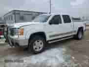 2010 GMC Sierra 1500 SLT z VIN 3GTRKWE29AG160857, wystawiony jako Copart lot #86632774 z przebiegiem 135 414 mil mil oraz Szkoda całkowita • Salvage title. Historia ofert i sprzedaży dostępna na DreamBid. Obrazek 1.