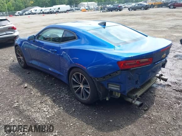 2018 Chevrolet Camaro 1LS z VIN 1G1FA1RX6J0133403, wystawiony jako IAAI lot #42991863 z przebiegiem 63 565 mil mil oraz . Historia ofert i sprzedaży dostępna na DreamBid. Obrazek 3.